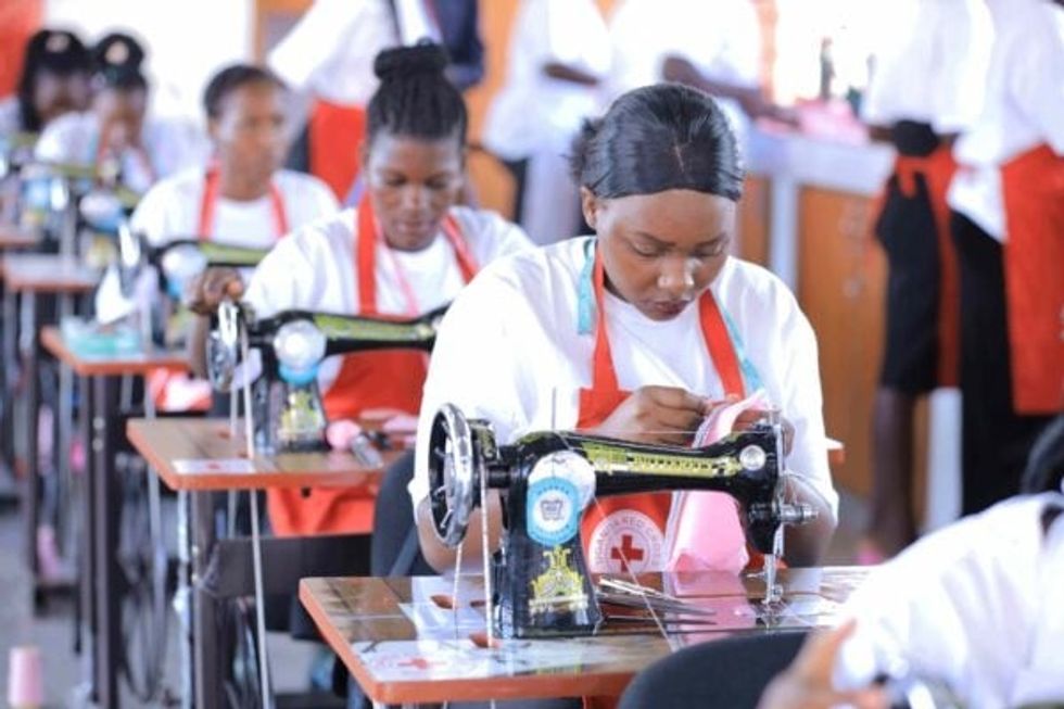 3 Newly trained staff working at manufacturing plant  1