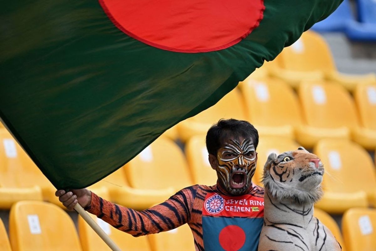 A Bangladesh cricket fan waves his country's national flag during an Asia Cup 2023 match