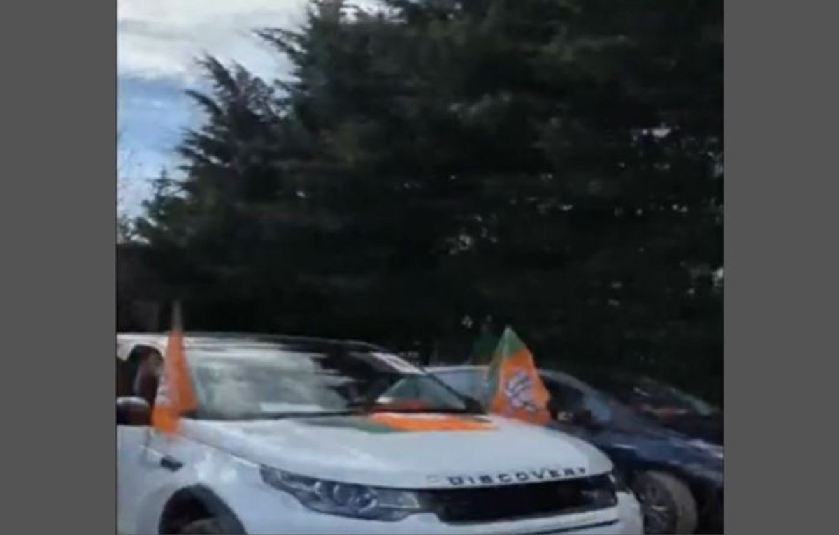 A car carrying the flag of India's ruling Bharatiya Janata Party led by prime minister Narendra Modi at a rally in London, UK, in support of the leader ahead of the 2024 general elections in India