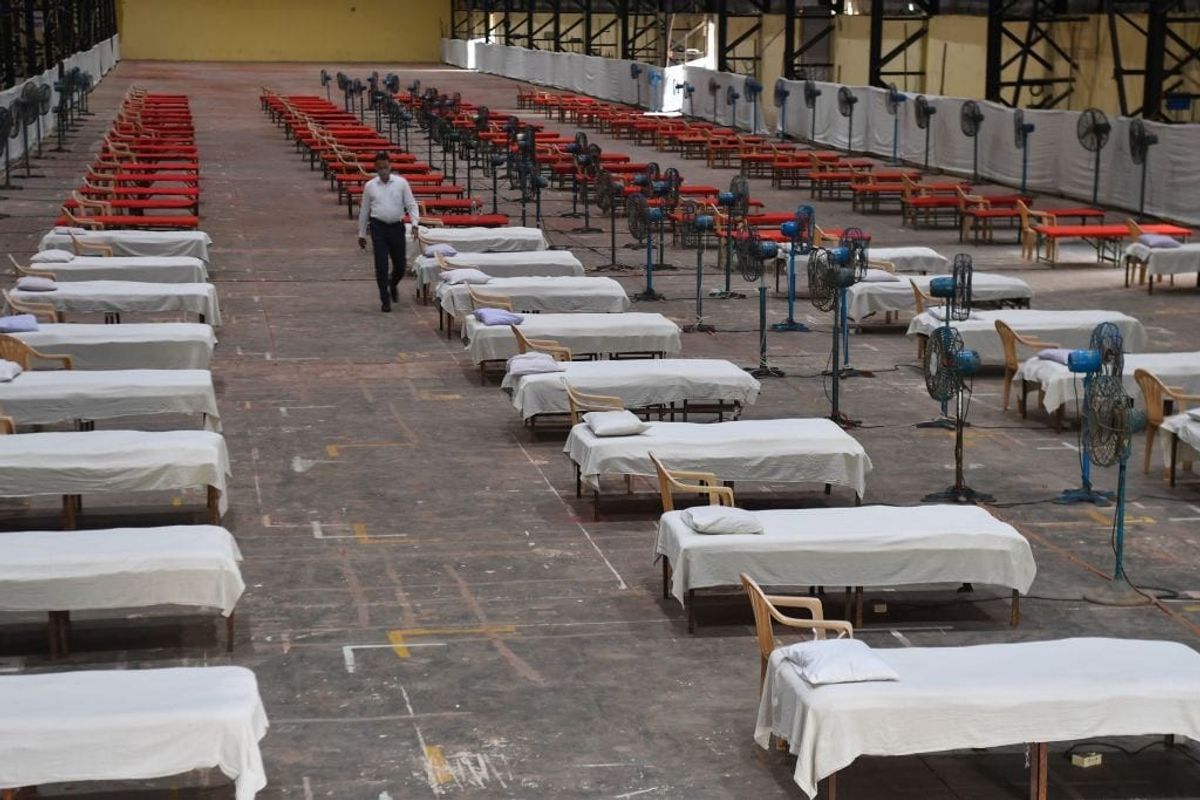 India to continue lockdown in hotspots as death toll nears 900