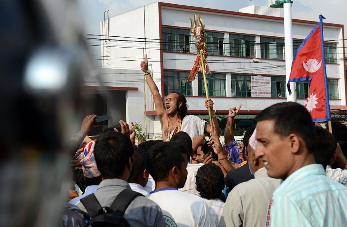 A Nepalese activist chants slogans during a protest demanding Nepal be declared a Hindu state in the national capital, Kathmandu