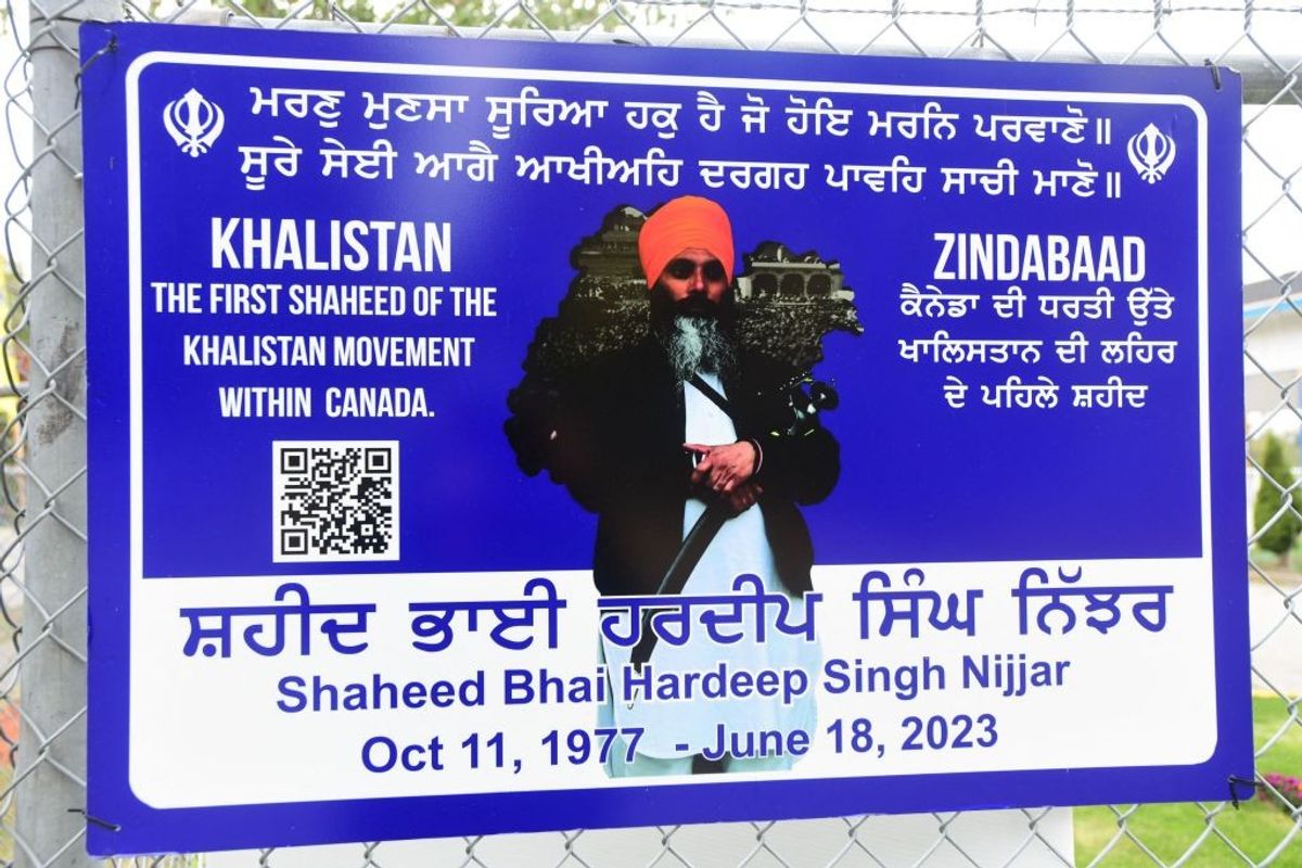 A poster of the former Gurdwara President Hardeep Singh Nijjar is displayed on a fence outside the Guru Nanak Sikh Gurdwara temple in Surrey, British Columbia, Canada