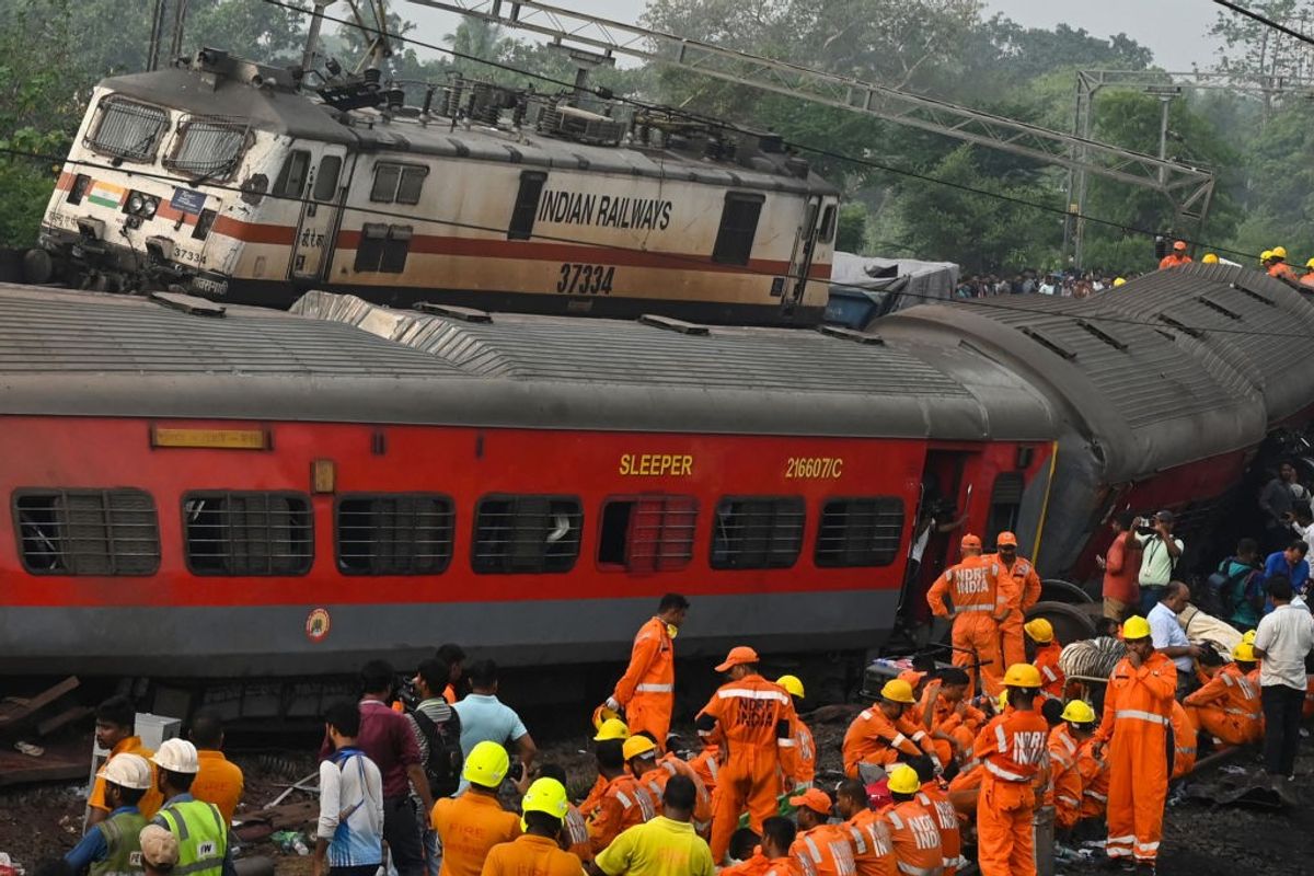 A scene from the site of a three-train collision in the eastern Indian state of Odisha
