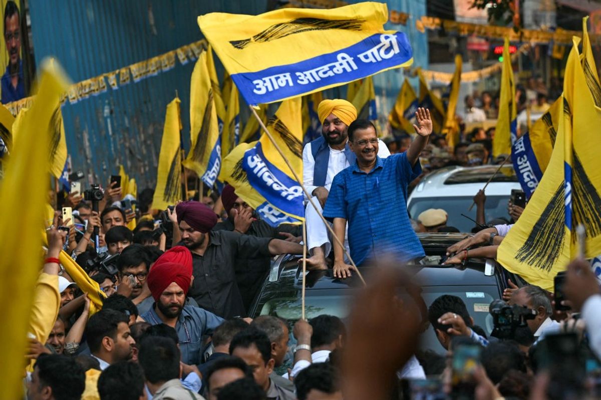 AAP leader and Delhi chief minister Arvind Kejriwal in a rally with party supporters.