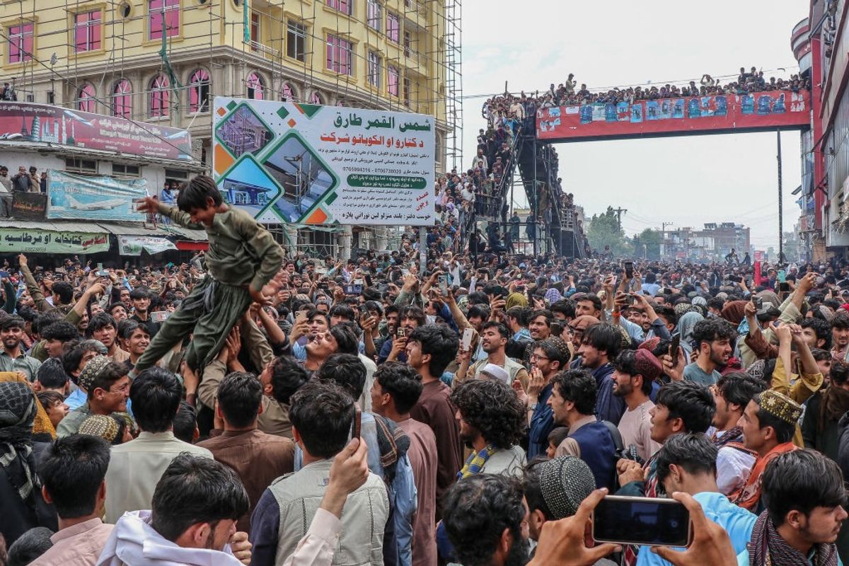 Afghanistan fans celebrate their country's win over Bangladesh in T20 World Cup 2024