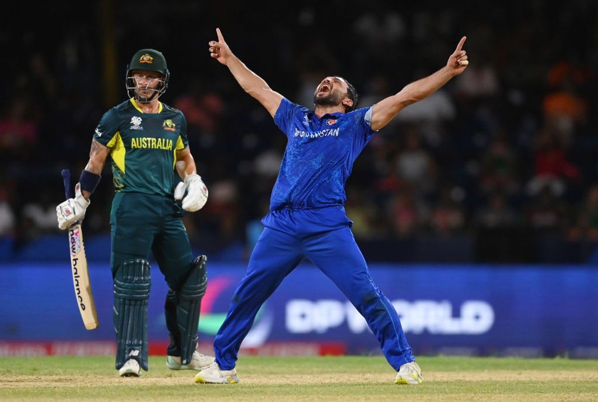 Afghanistan's Gulbadin Naib celebrates after his team beat Australia in at20 World Cup Super Eight match on June 22.
