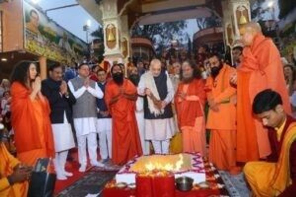 Amit Shah participates in Parmarth Niketans Ganga Aarti ceremony 4