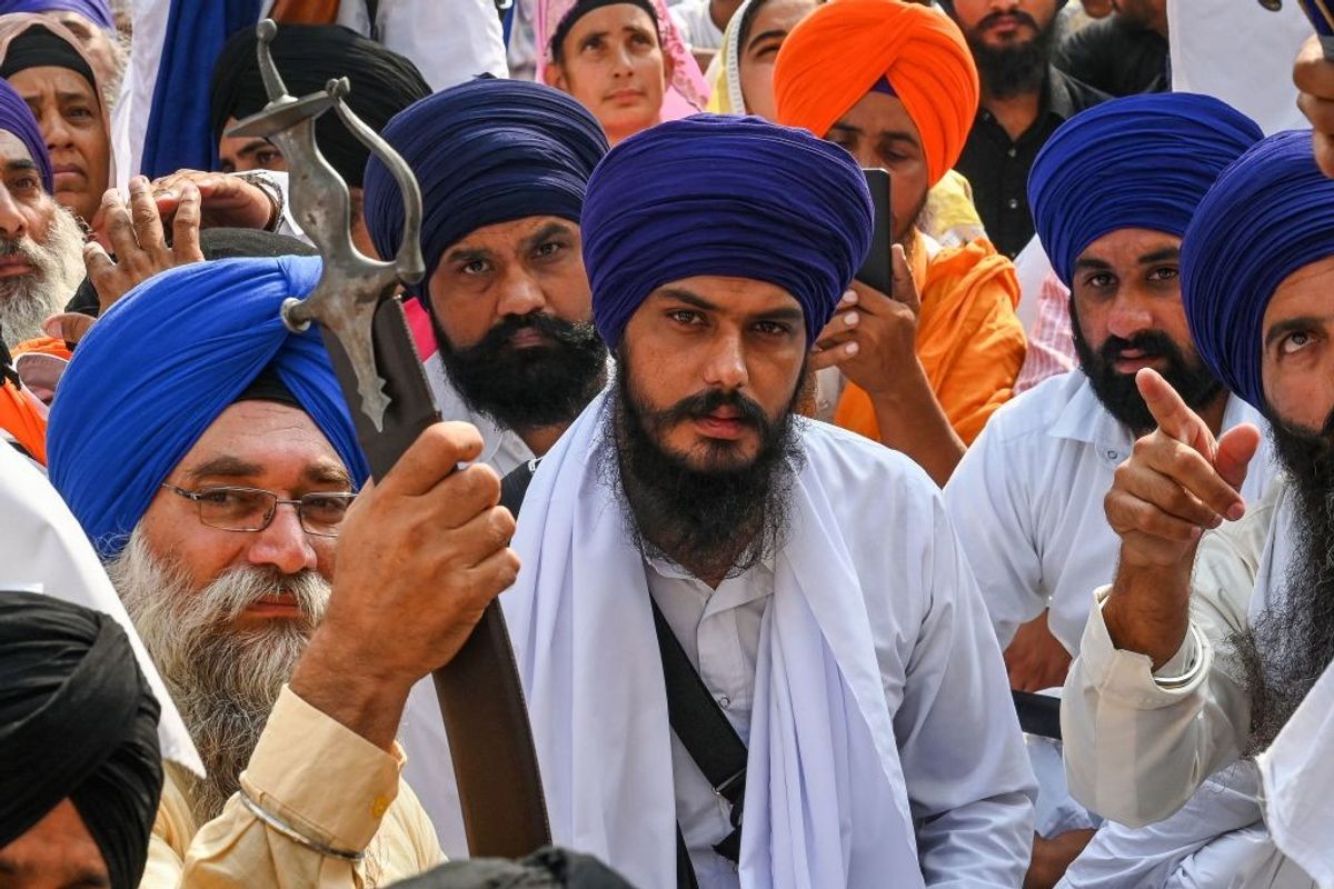 Amritpal Singh (C) at a ceremony at Akal Takht Sahib in the Golden Temple in Amritsar in India's Punjab