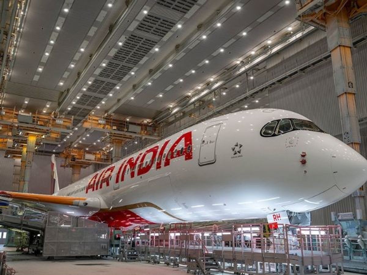 An A350 aircraft bearing the logo of rebranded Air India at a paint shop in Toulouse, France.