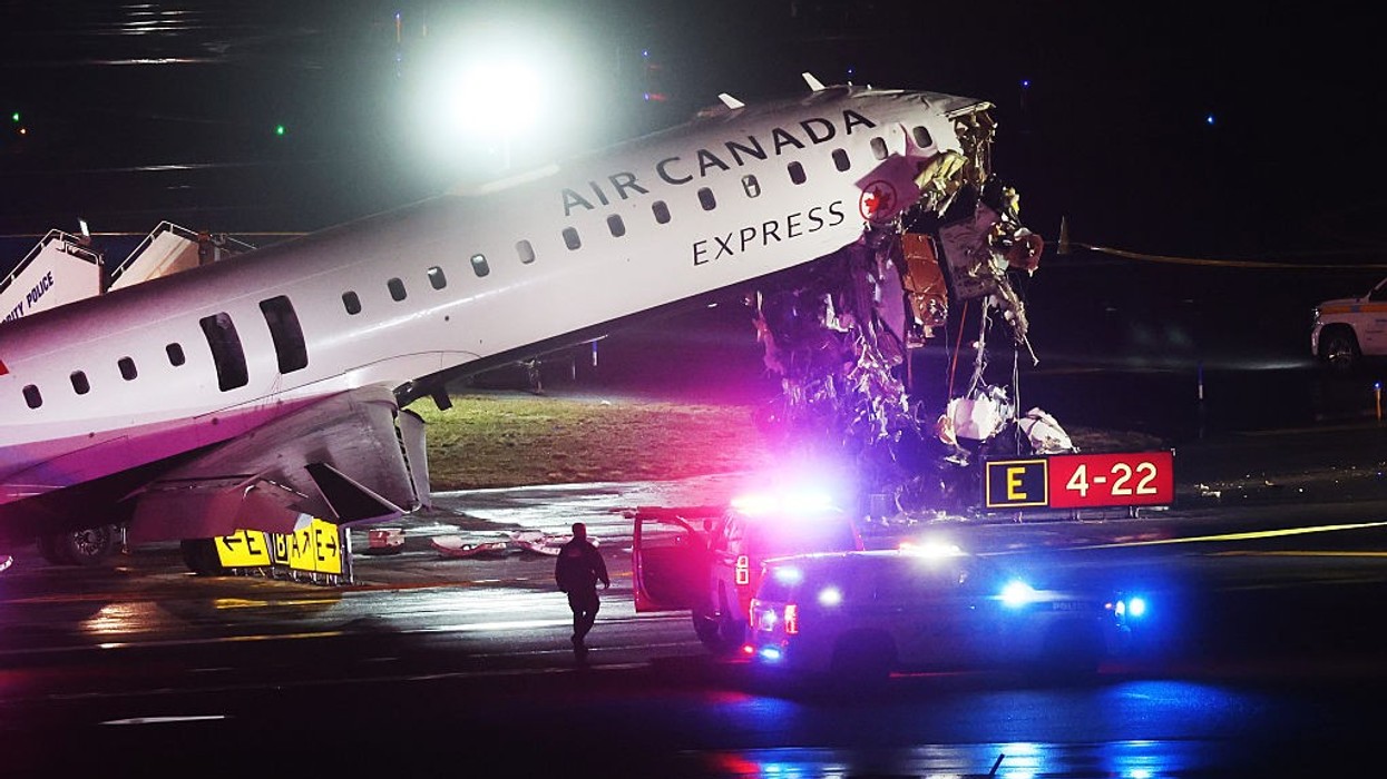 Air Canada Express jet crash caught on CCTV as plane collides with fire truck at LaGuardia