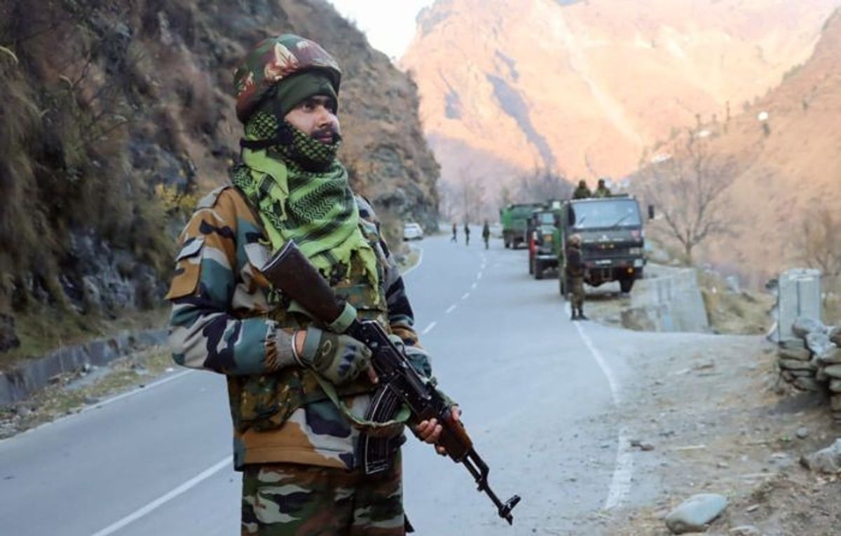 An Indian soldier keeps a vigil in Poonch in India's Jammu and Kashmir