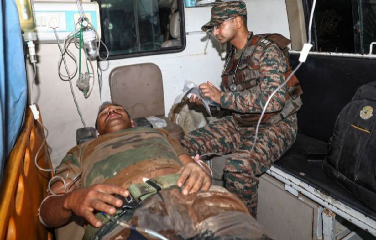 An injured soldier of the Indian Army being taken to a hospital for treatment following a terrorist attack on an Army convoy, in Kathua district of the Indian Union Territory of Jammu and Kashmir on Monday, July 8, 2024. At least five army personnel were killed in the terrorist attack