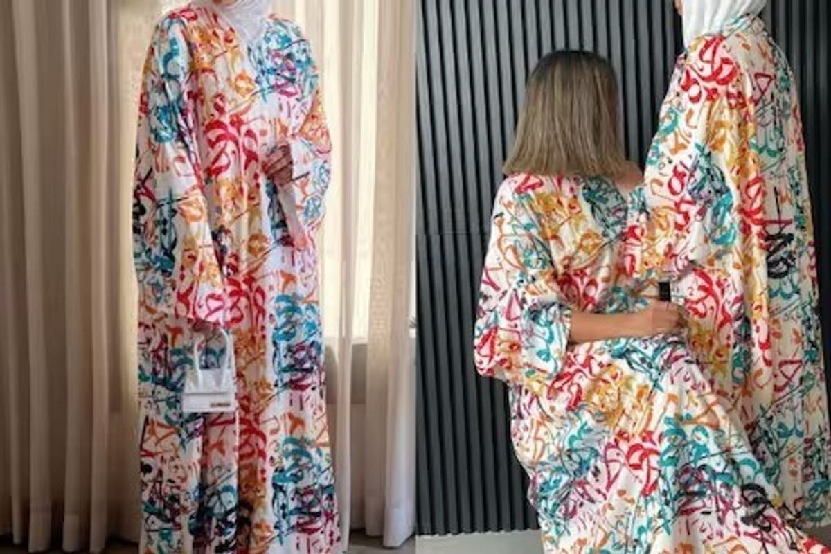 Lahore crowd angered by a woman wearing print dress with Arabic words