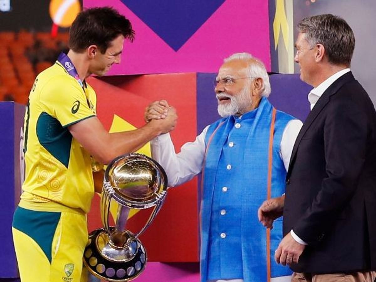 Australia captain Pat Cummins with Indian prime minister Narendra Modi and Australian deputy prime minister Richard Marles
