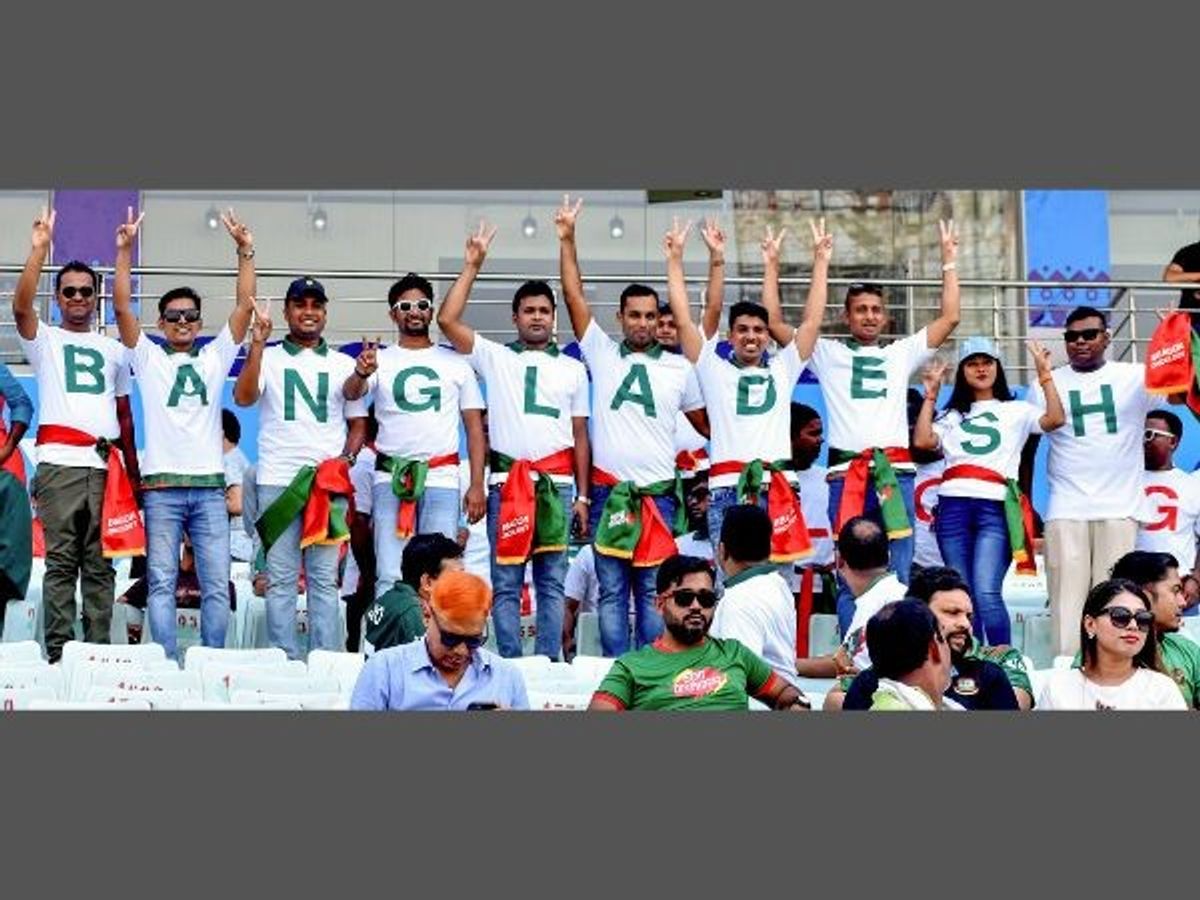 Bangladeshi cricket fans at an Indian stadium during a World Cup 2023 match