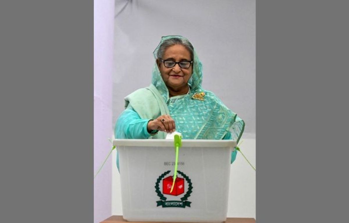 Bangladeshi prime minister Sheikh Hasina casts her vote at a polling station in Dhaka, Bangladesh.