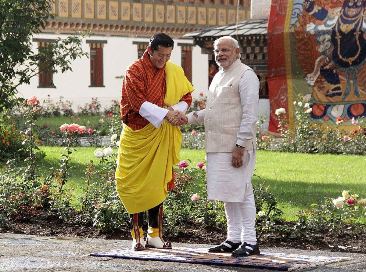 Bhutanese king Jigme Khesar Namgyel Wangchuck (L) with Indian prime minister Narendra Modi