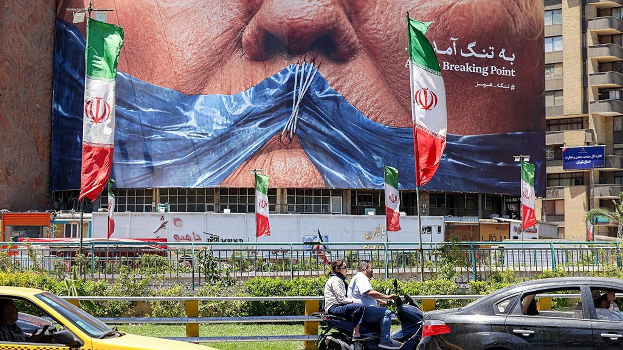 Billboard featuring US President Donald Trump and the Strait of Hormuz