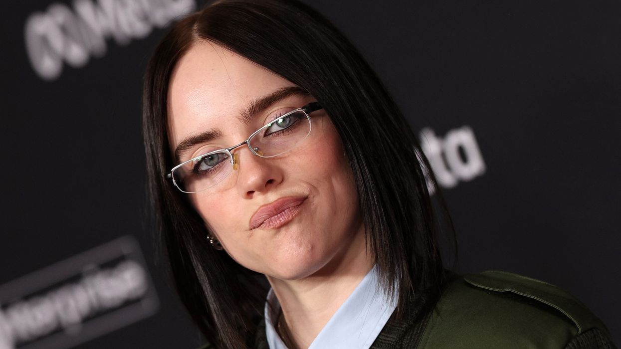 Billie Eilish shifts from baggy style to polka-dot tank top