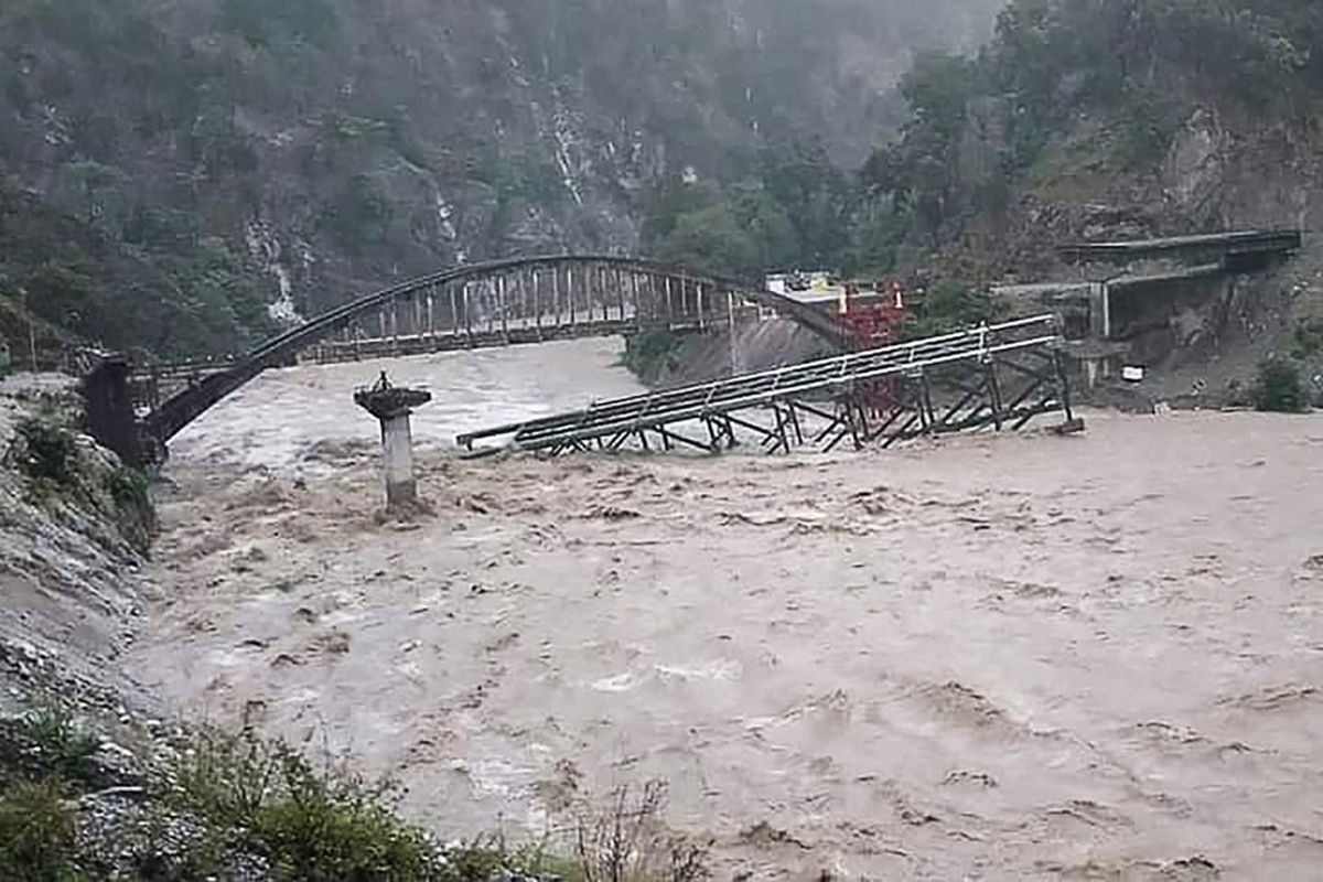 Bridge collapses in flood