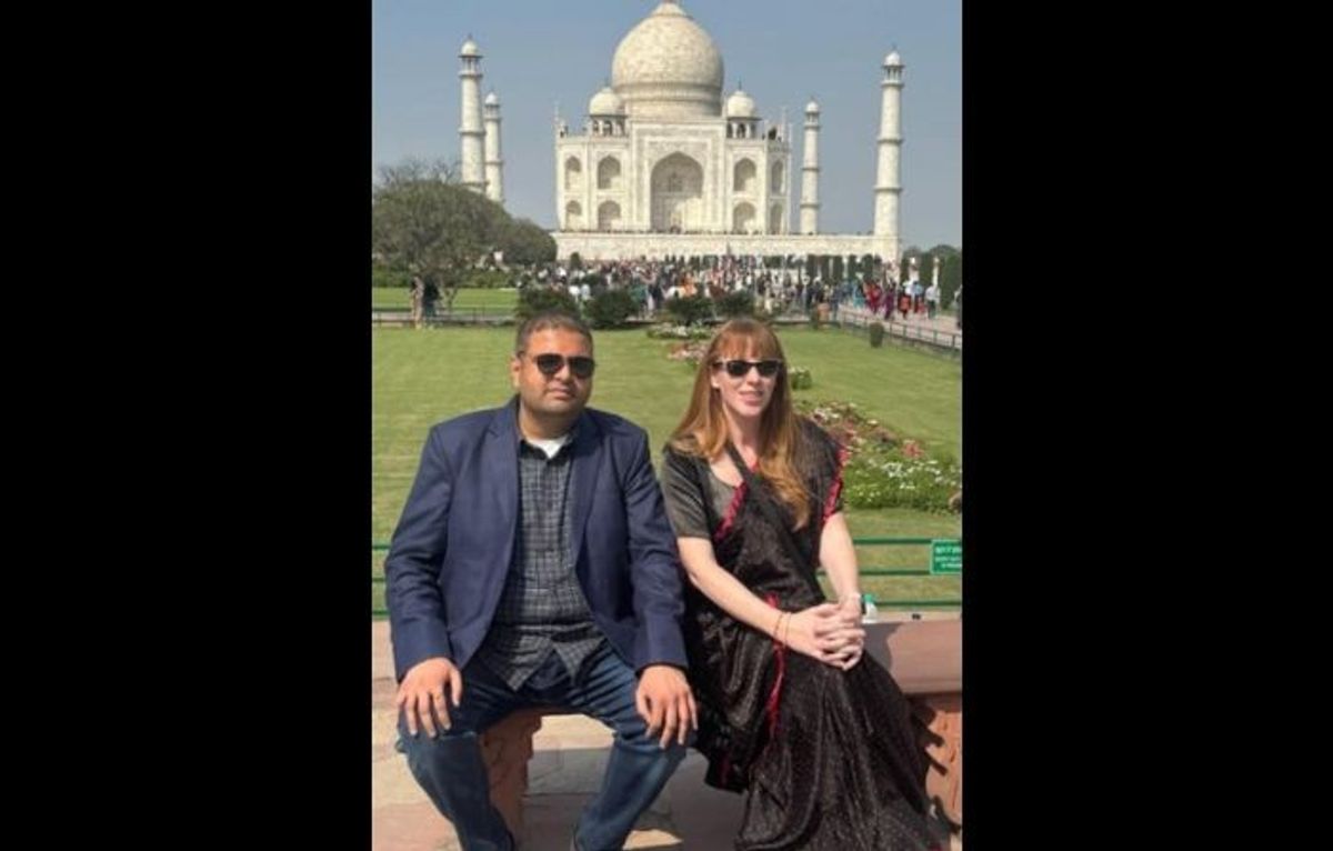 British deputy shadow PM Angela Rayner and Navendu Mishra MP in front of Taj Mahal in Agra, India.
