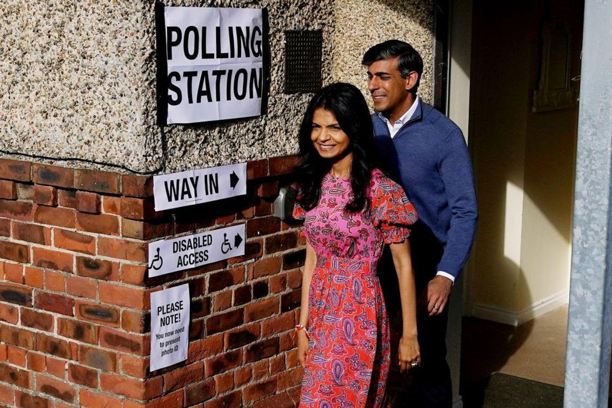 British prime minister Rishi Sunak with wife Akshata Murty after casting their votes in the 2024 general elections