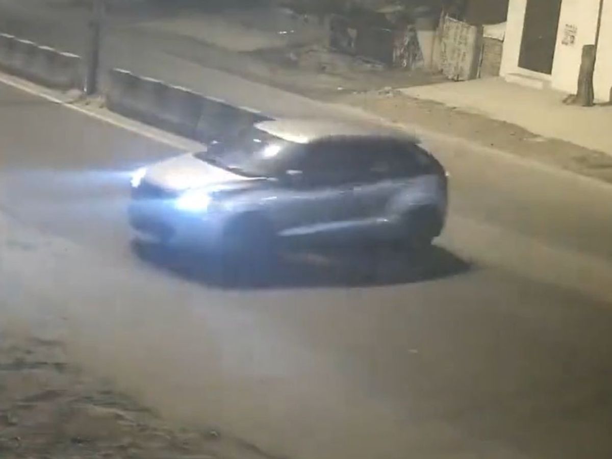 CCTV footage of a car alleged dragging a woman's body on a road in Delhi in the early hours of New Year's Day 2023.