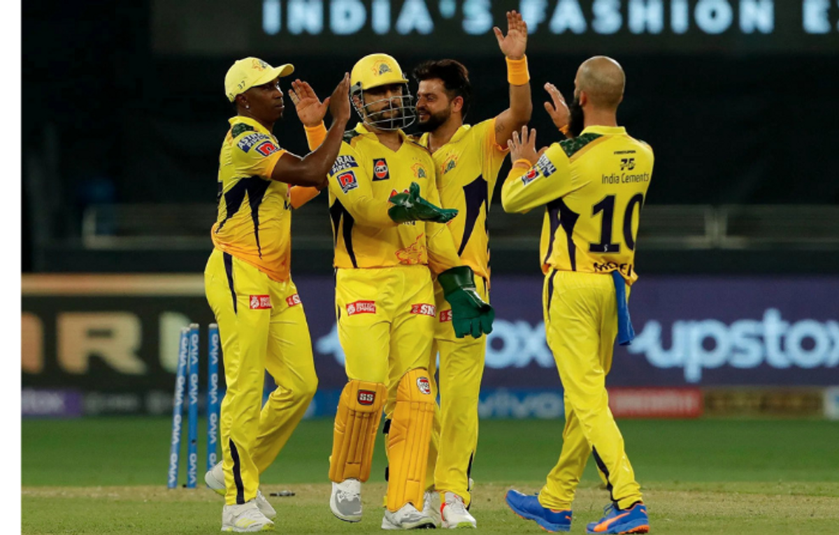Chennai Super Kings players celebrate during an IPL match.