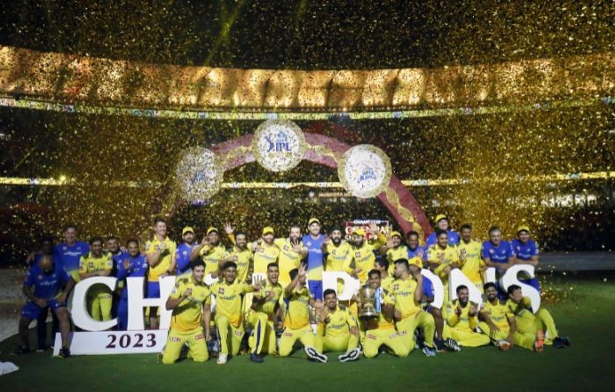 CSK cricketers celebrate after winning IPL 2023 trophy