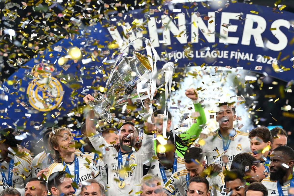 Daniel Carvajal of Real Madrid lifts the UEFA Champions League Trophy after his team's victory in the UEFA Champions League 2023/24 Final match between Borussia Dortmund and Real Madrid CF at Wembley Stadium in London, England
