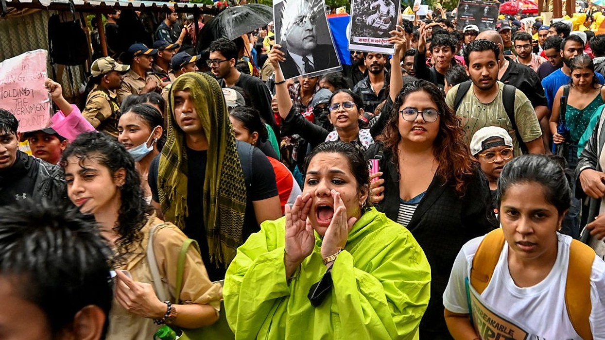 Demonstrators shout slogans