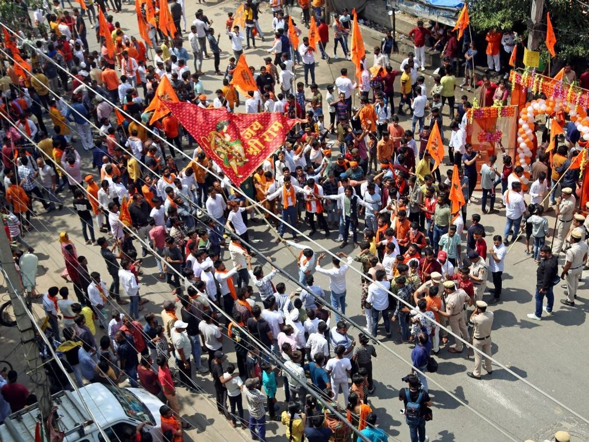 Devotees participate in a procession on the occasion of the Ram Navami celebrations in New Delhi