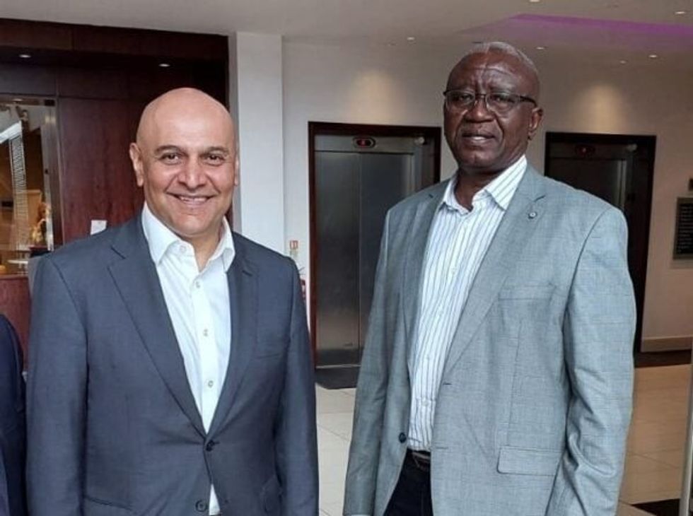 Dr Nik Kotecha OBE DL with Robert Kwesiga Uganda Red Cross Secretary General Copy  1