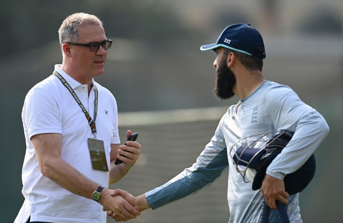 ECB chief executive Richard Gould shakes hands with England cricketer Moeen Ali.