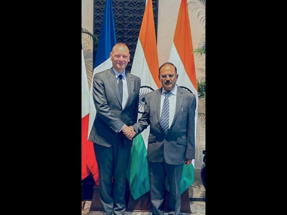 Emmanuel Bonne, diplomatic advisor to French president Emmanuel Micron (L) with Indian national security advisor Ajit Doval