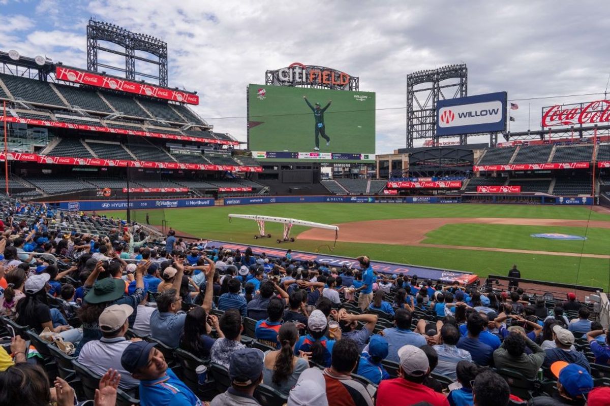 Fans react as they watch the India-Pakistan T20 Cricket World Cup match at a watch party at Citi Field on June 9, 2024 in New York City.