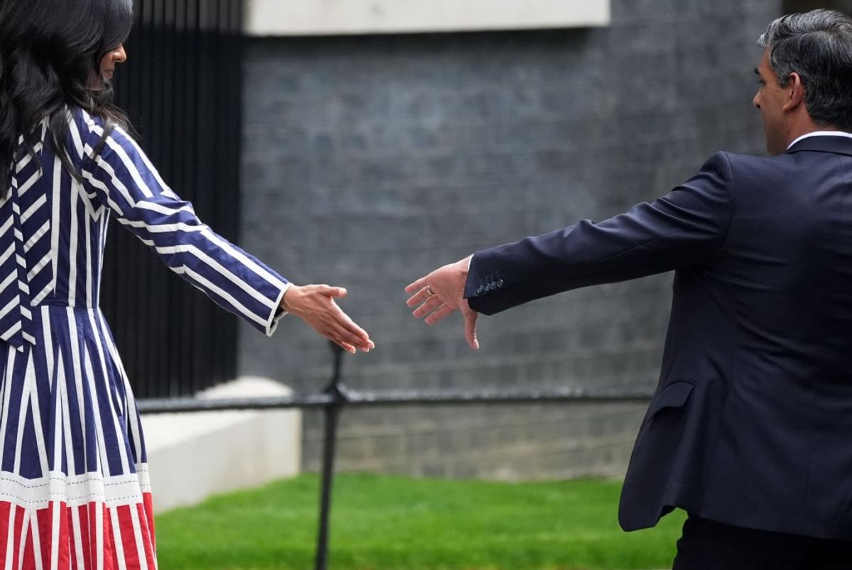 Former British prime minister Rishi Sunak leaves 10 Downing Street with wife Akshata Murty after his Conservative Party loses general election