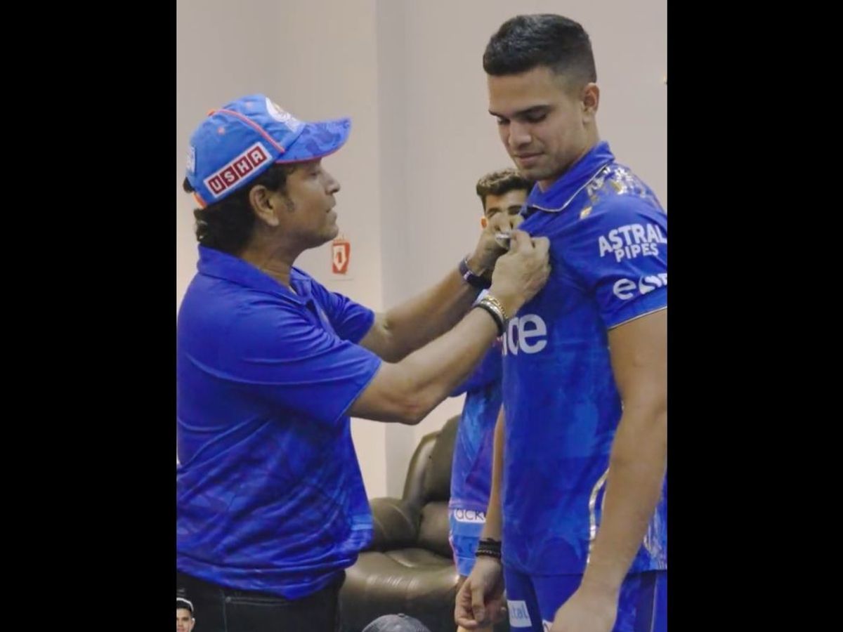 Former India cricket captain Sachin Tendulkar honours his son and Mumbai Indians player Arjun Tendulkar after his show with the ball in a game against Sunrisers Hyderabad in IPL 2023 in which he picked his maiden wicket.