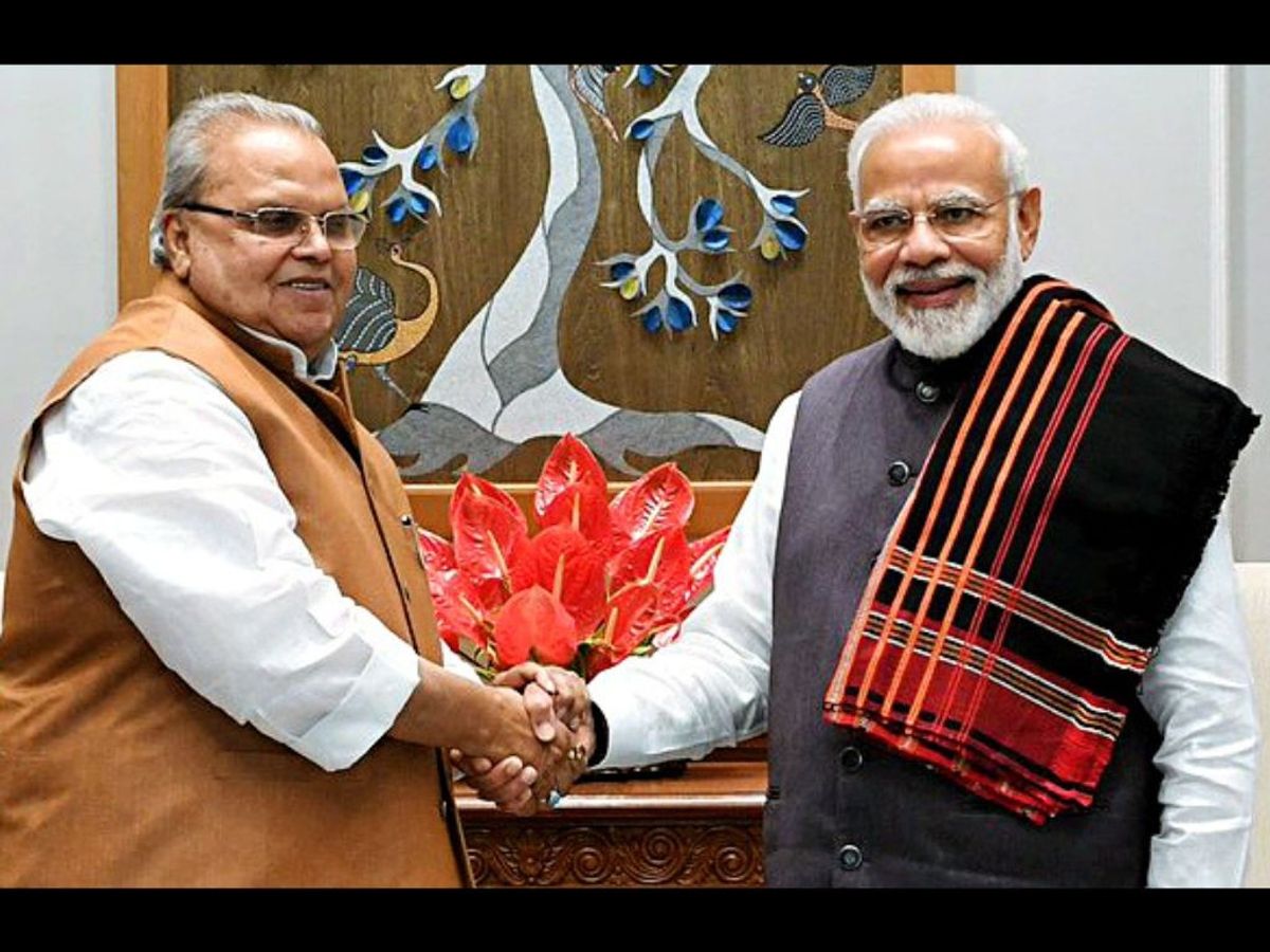 Former Jammu and Kashmir governor Satya Pal Malik with prime minister Narendra Modi in New Delhi