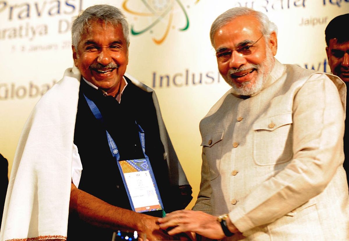 Former Kerala chief minister Oommen Chandy with Narendra Modi