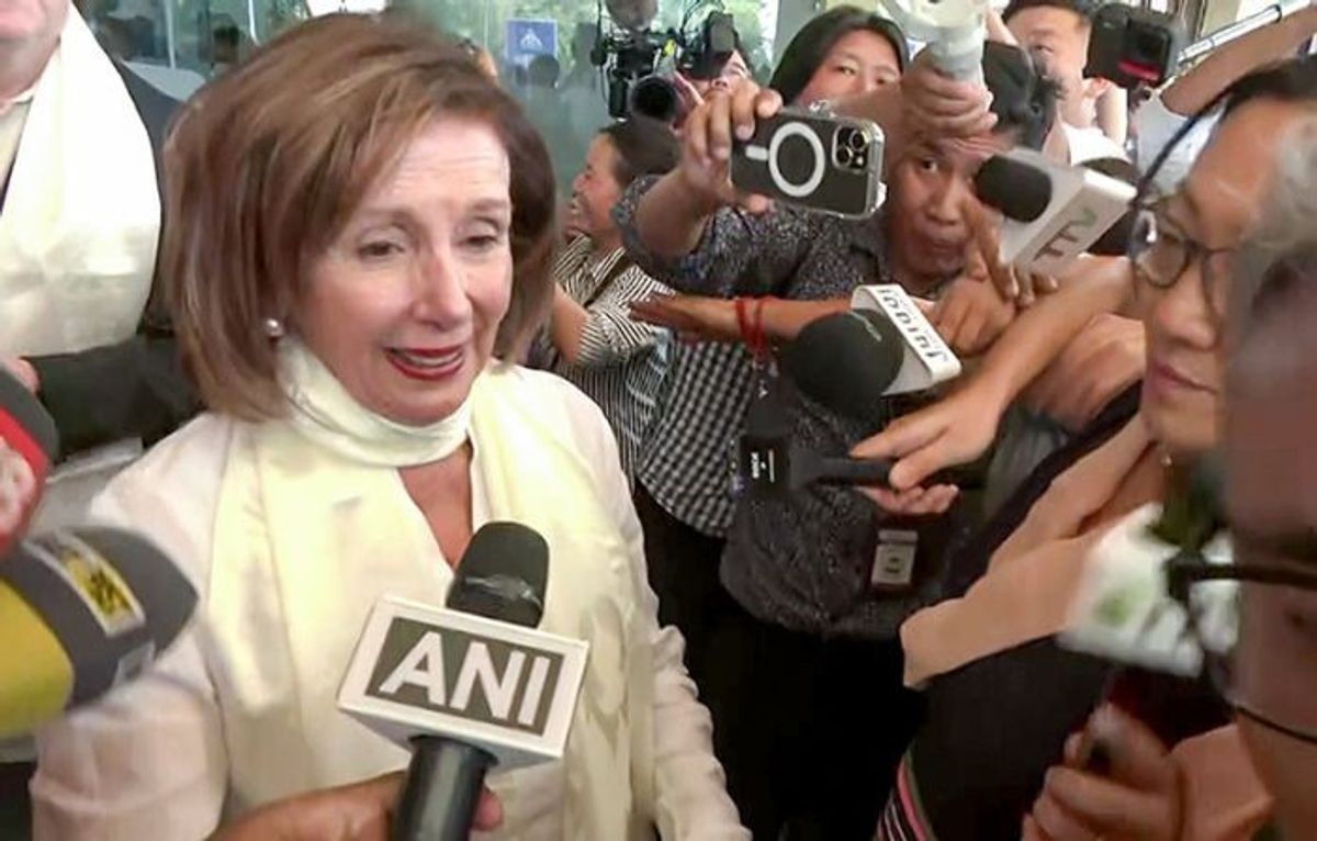 Former US House speaker Nancy Pelosi speaks to the media as she arrives with a US delegation at the airport in Dharamsala in the northern Indian state of Himachal Pradesh to meet Tibetan spiritual leader Dalai Lama