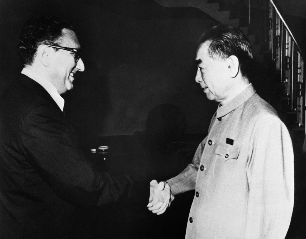Former US national security adviser Henry Kissinger (L) shakes hands with former Chinese premier Zhou Enlai (R) in Beijing in 1971.