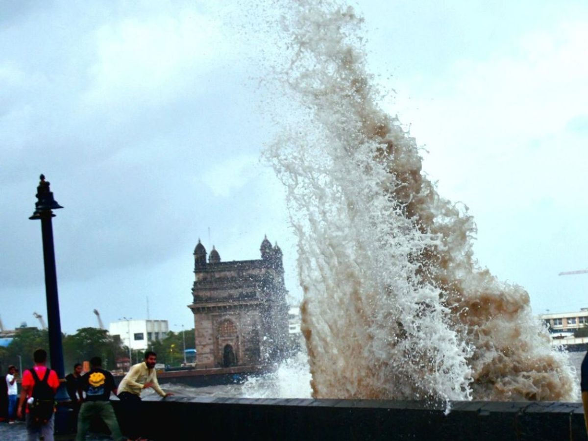 High sea waves strike the coast near the Gateway of India as an impact of Cyclone Biparjoy, in Mumbai