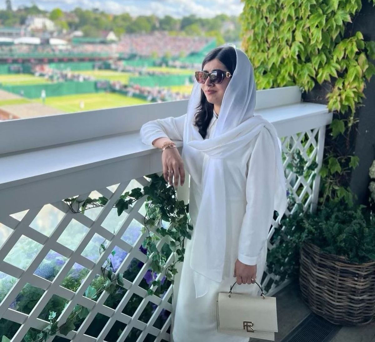 Malala rocks a Ralph Lauren outfit as she attends Wimbledon tennis match with husband