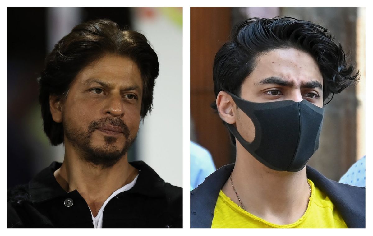 Fan tries to hold Shah Rukh Khan’s hand, watch how son Aryan protects him