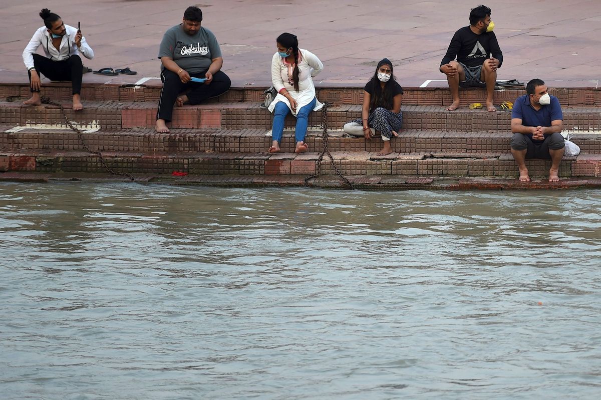 Pilgrims trickle back to the Ganges as India lockdown eases