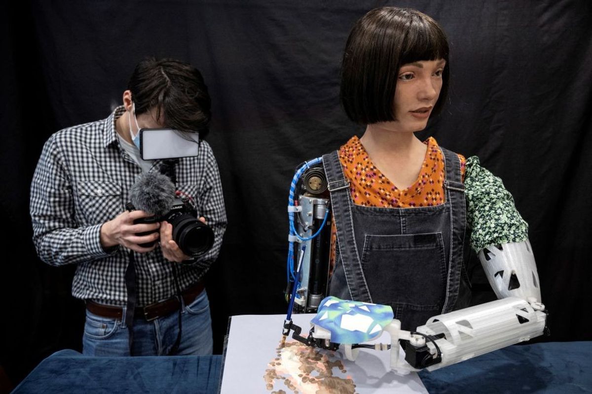 ‘Although not alive, I can still create art,’ robot Ai-Da tells UK lawmakers