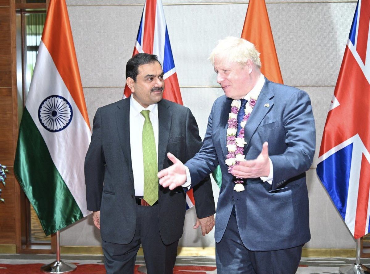 Johnson meets Adani in Ahmedabad