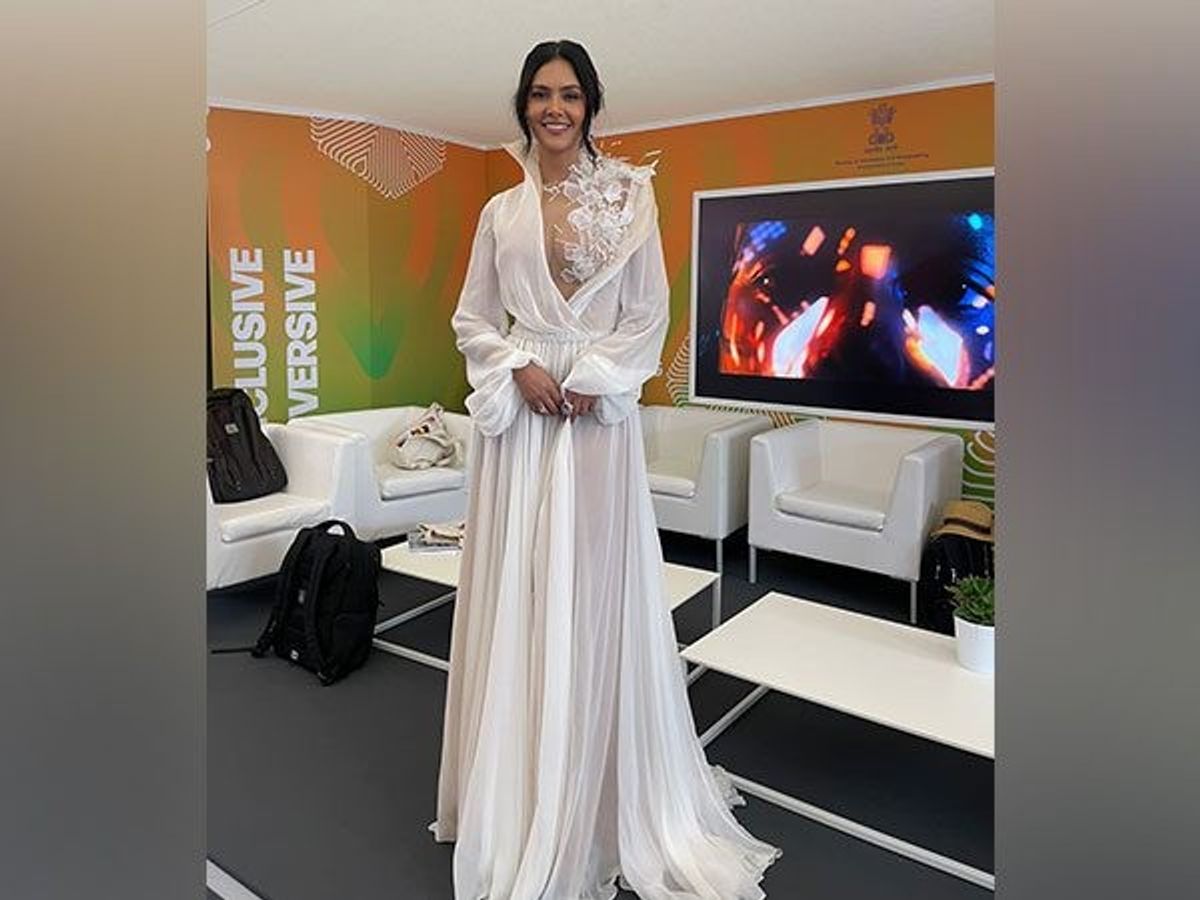 Cannes 2023: Esha Gupta stuns in white thigh-high slit gown