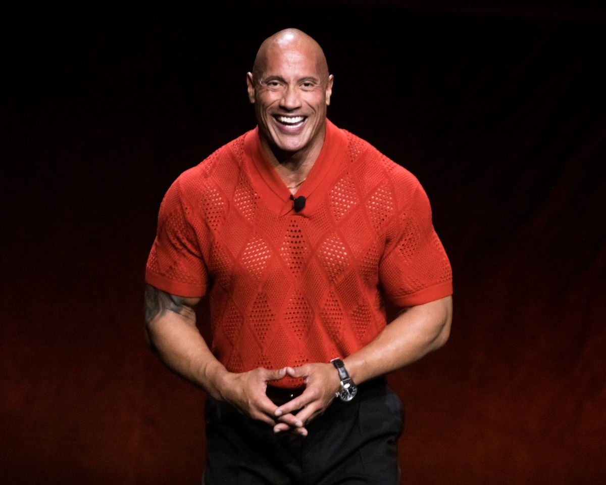 Dwayne Johnson’s Brazilian look-alike is a hit in Rio de Janeiro but gets bitten by a l**ty female tourist on a beach